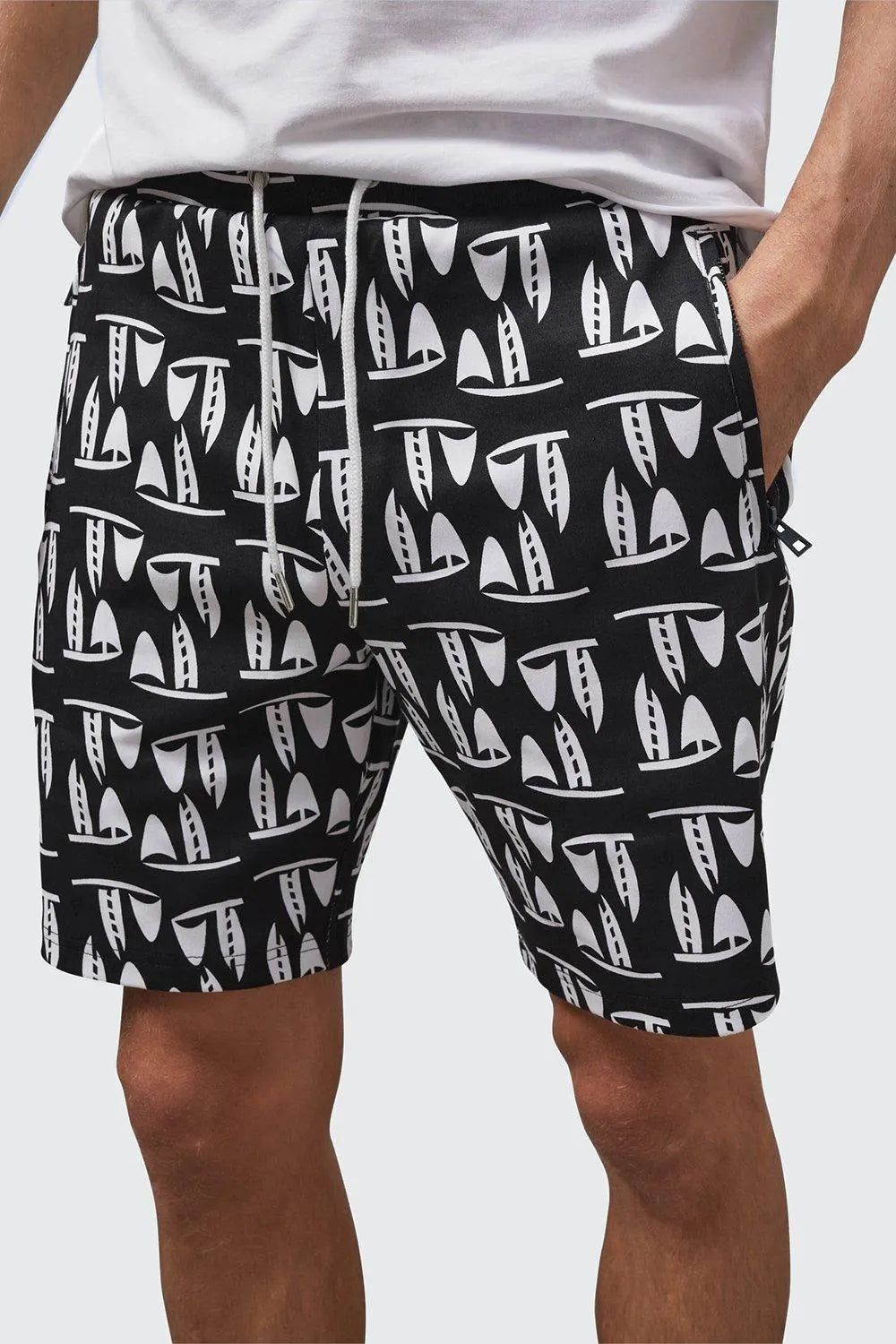 Front view black sailboat print mens drawstring shorts with zip pockets and relaxed fit