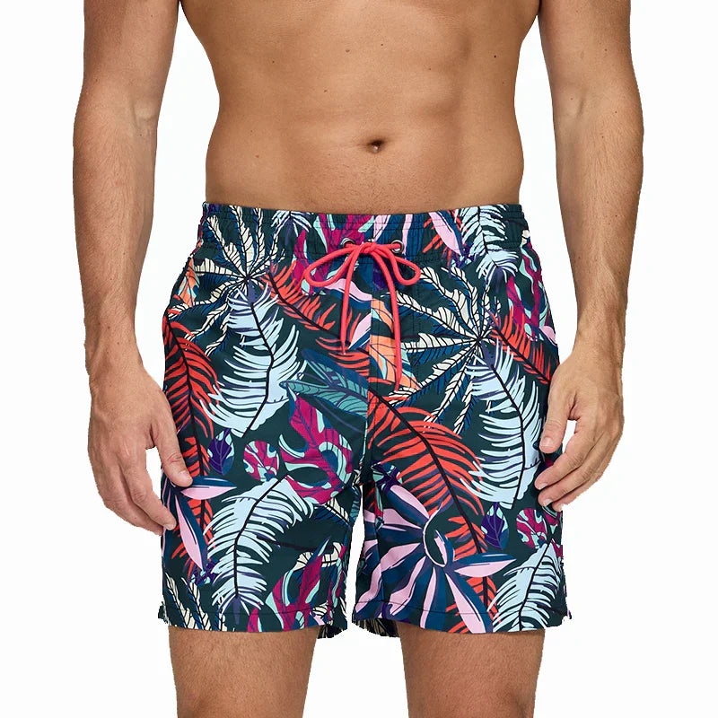 Men tropical leaf printed swim shorts with pockets, navy base and red drawstring waist