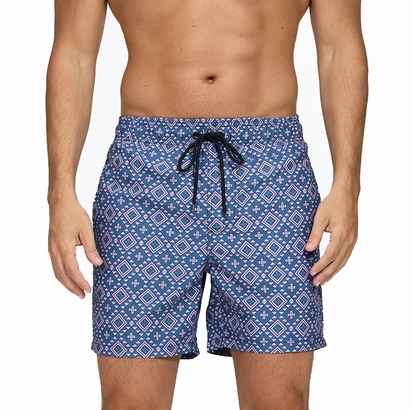 Blue geometric print swim shorts for men with pockets and black drawstring waistband
