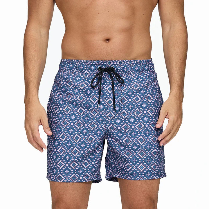 Blue geometric print swim shorts for men with pockets and black drawstring waistband