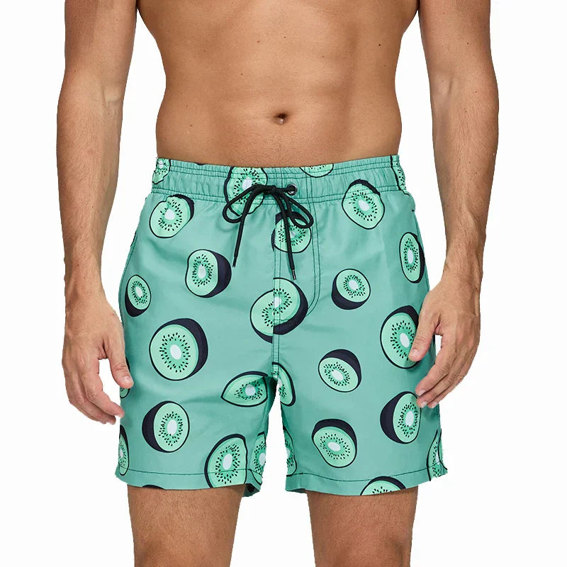 Mint green kiwi print men swim shorts with pockets and black drawstring waistband