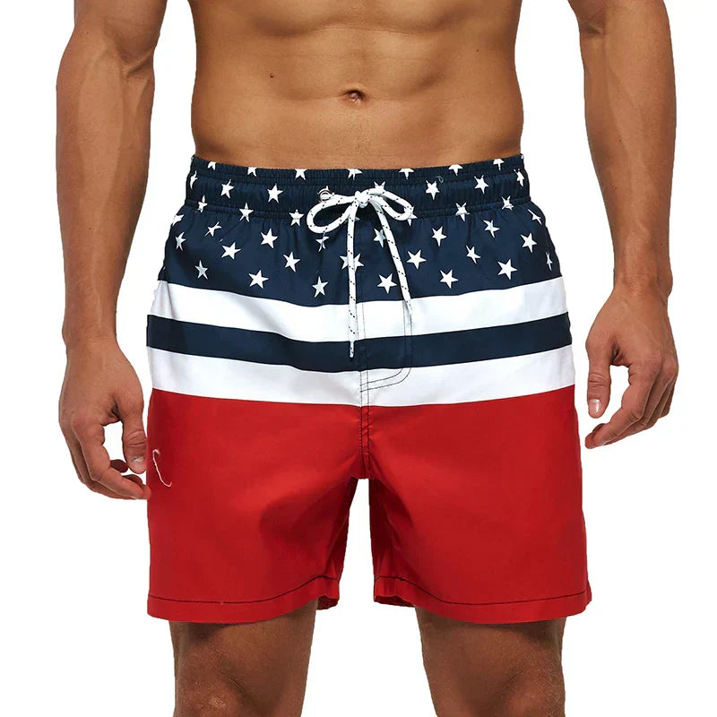 Red white and navy striped swim shorts with stars, pockets and white drawstring waist