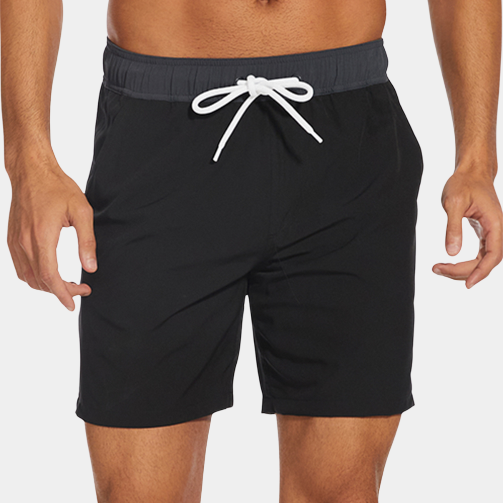 Black quick dry swim trunks with elastic waist and white drawstring, front view mens swimsuit