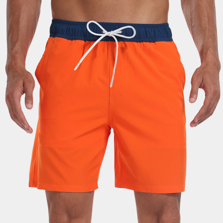 Orange quick dry swim trunks with navy waistband and white drawstring, front view mens swimsuit