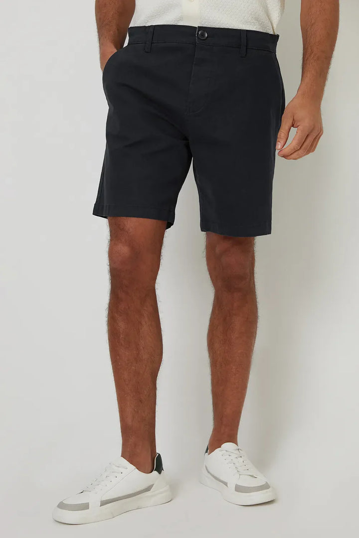 Black regular fit men’s chino shorts with belt loops, button waist and clean hem finish