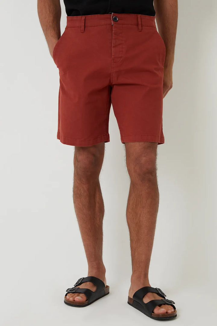Rust red men’s regular fit chino shorts featuring belt loops, button closure and pockets