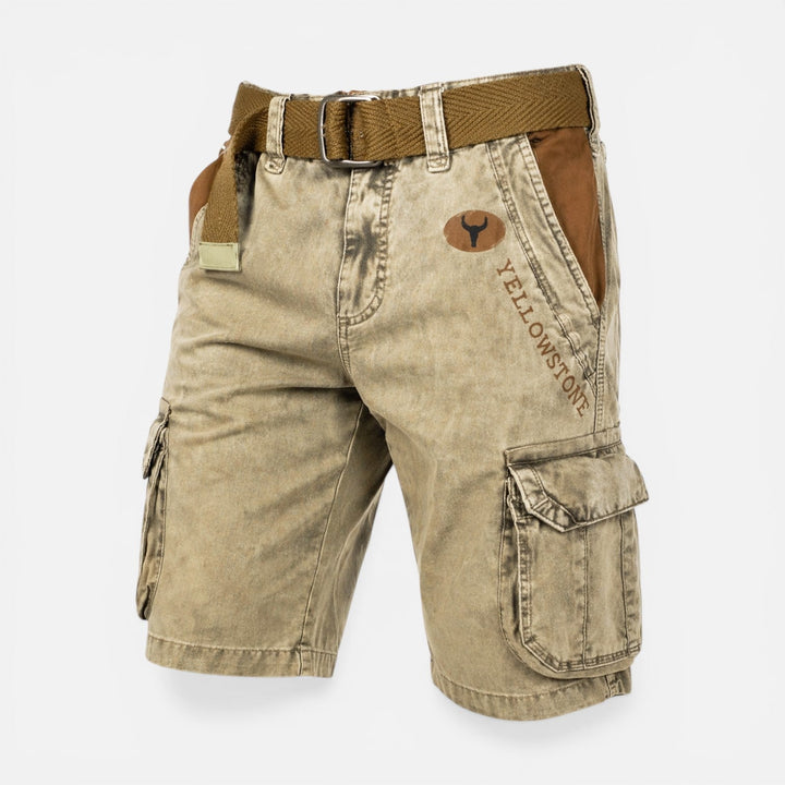 Front view of tan men's cargo shorts with flap pockets and worn wash finish