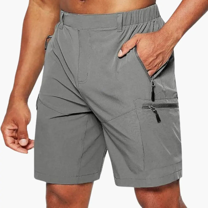 Gray ripstop cargo shorts with zipper pockets and elastic waist for men
