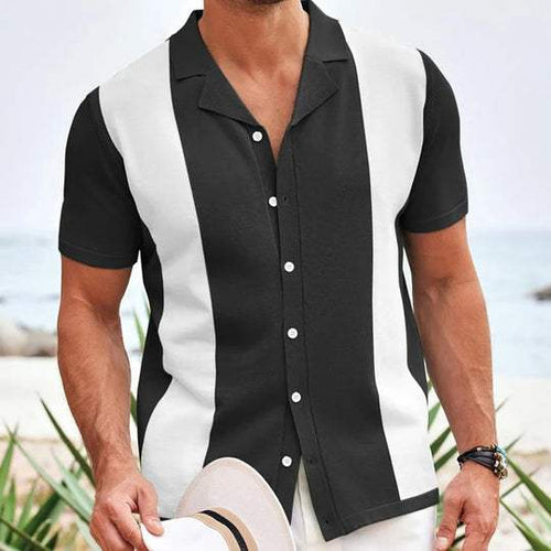 Black short sleeve polo shirt with white contrast panels and button front