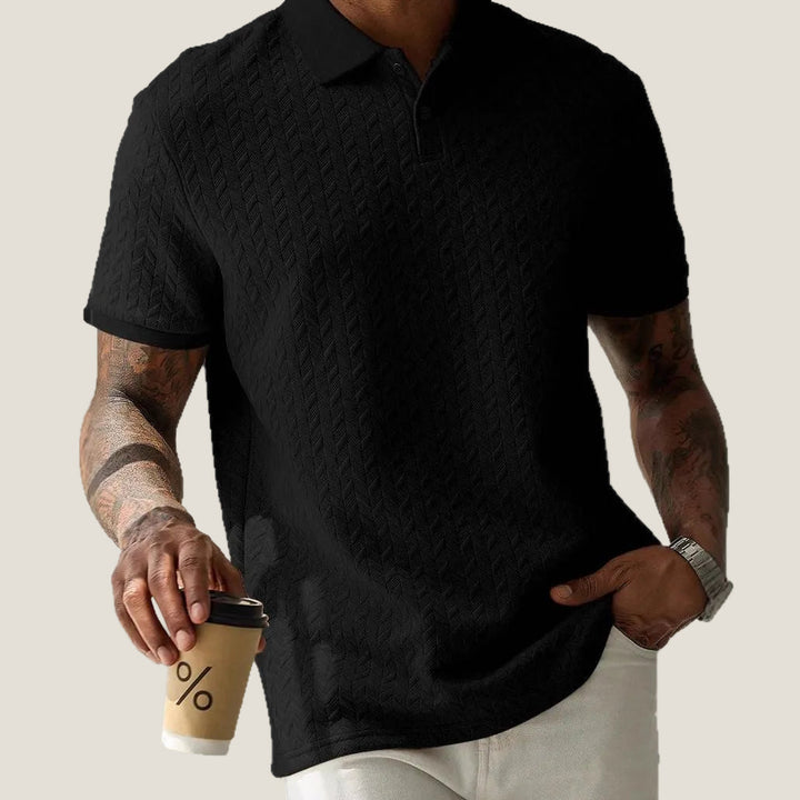 Black short sleeve textured knit polo shirt with subtle geometric knit and classic collar