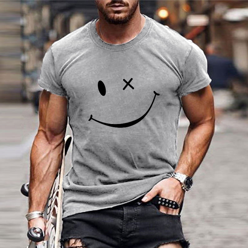 Light gray crew neck short sleeve t shirt with bold smiley face front print