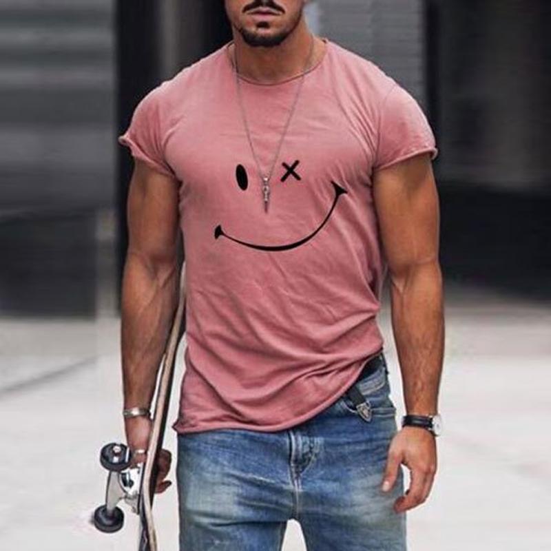 Pink crew neck short sleeve t shirt with smiley face print and casual streetwear style