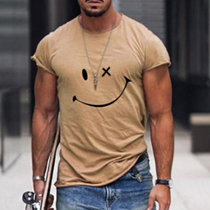 Tan crew neck t shirt with smiley face graphic, short sleeves and relaxed fit