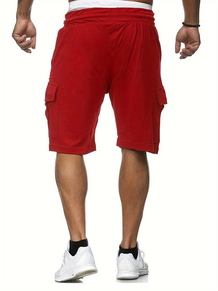 Back view of red men summer cargo knee length shorts with pockets and straight hem