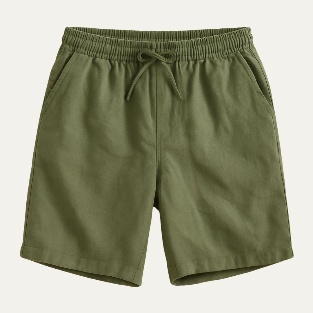 Olive green cotton beach shorts with elastic waist, drawstring, and side pockets