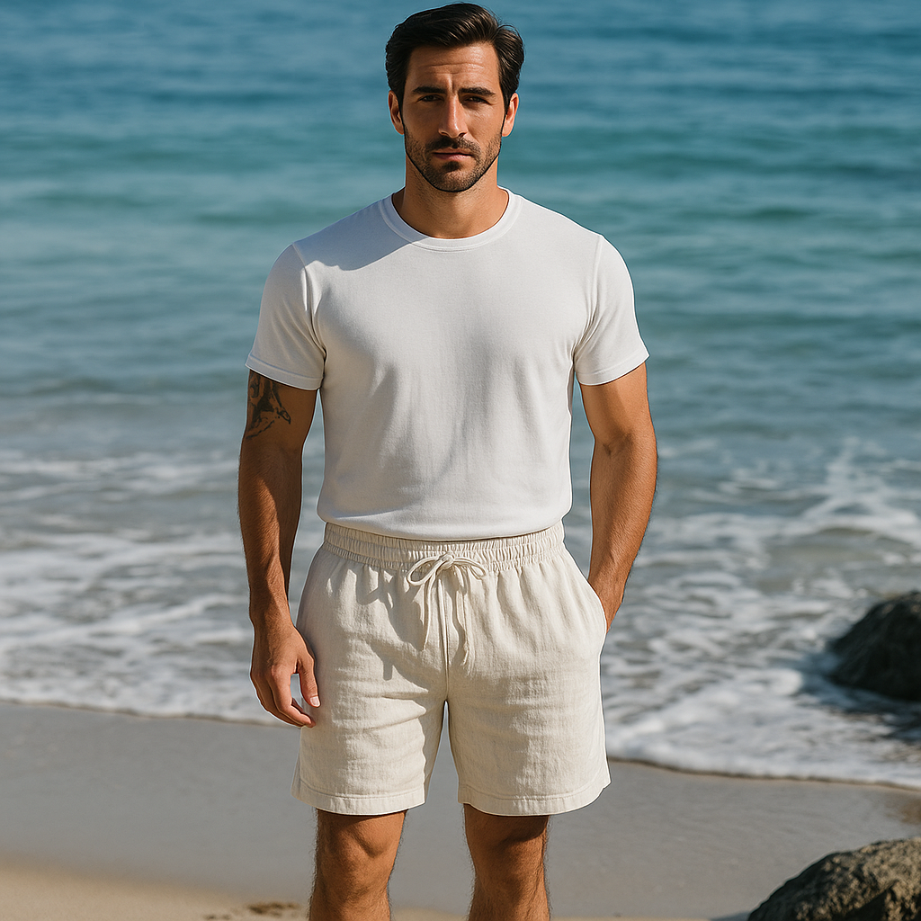 Men wearing cream summer shorts with white t shirt at the beach