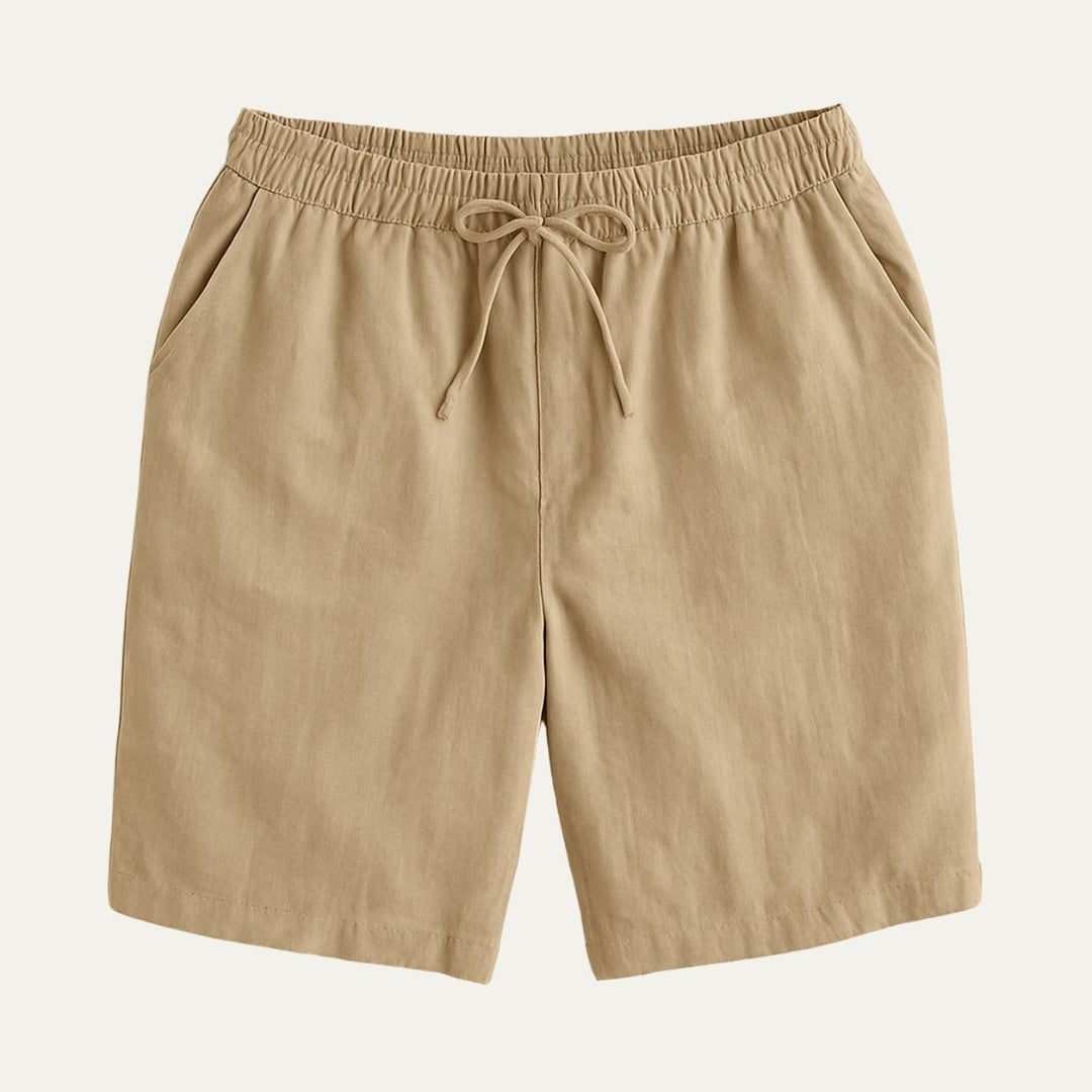 Tan cotton beach shorts with drawstring waist and straight leg cut