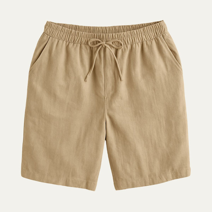 Tan cotton beach shorts with drawstring waist and straight leg cut