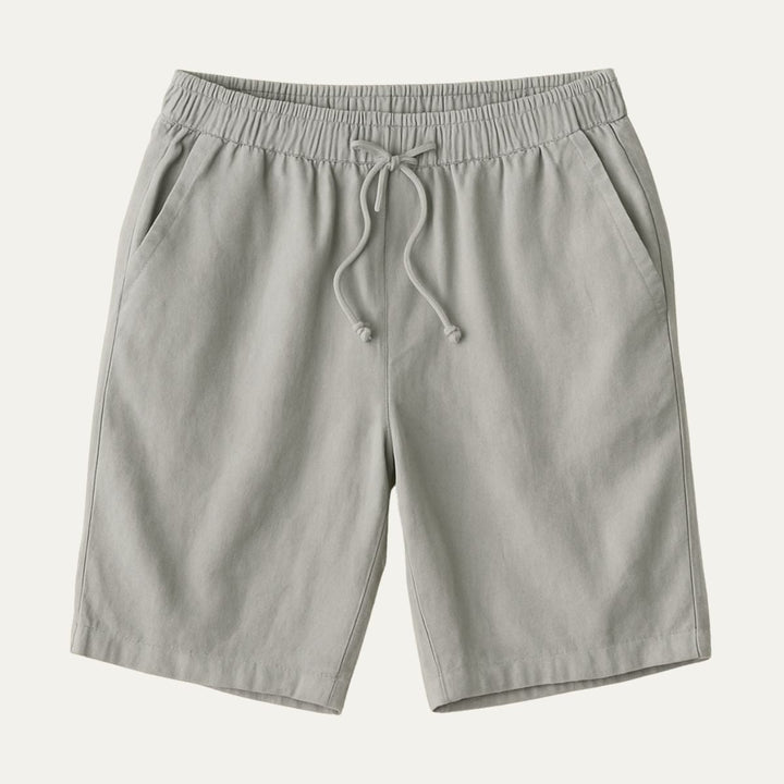 Light gray men beach shorts with elastic waistband, drawstring, and pockets