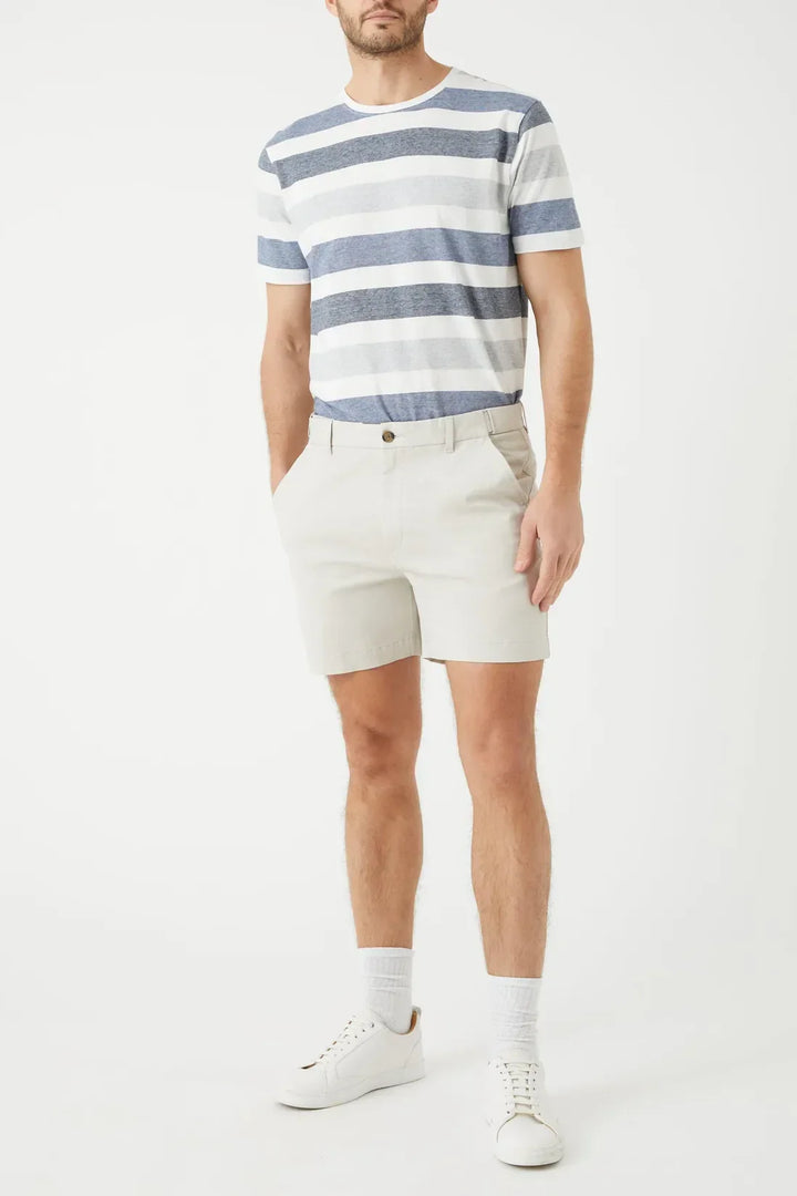 Light beige men summer tailored shorts with pockets, front view with button waist and clean hem