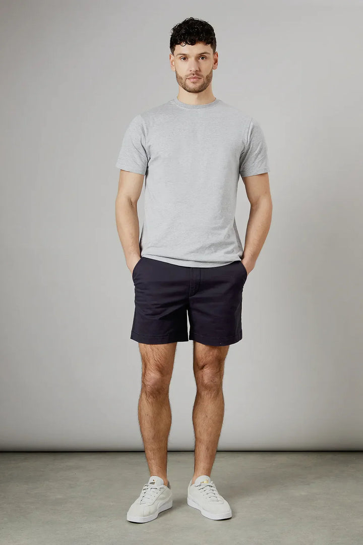Navy men summer tailored shorts with pockets, front view with cuffed hem and button waist