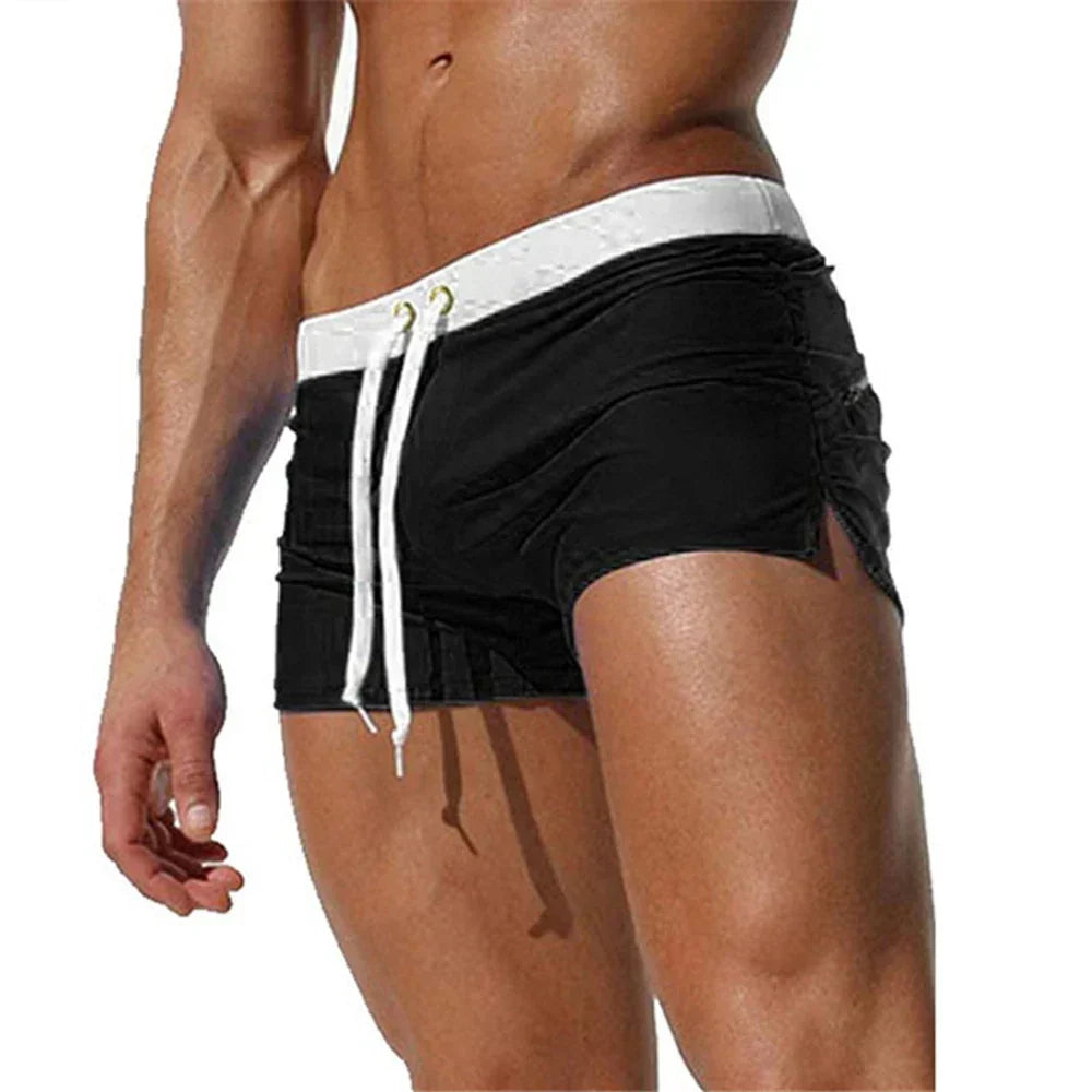 Red men swim shorts with white waistband, front drawstring, and short cut