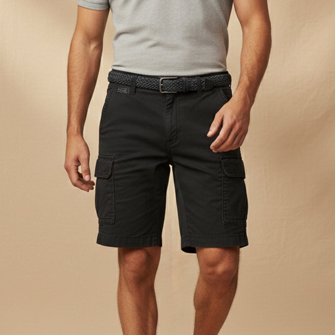 Black tactical cargo shorts with side pockets worn on model, casual mens shorts