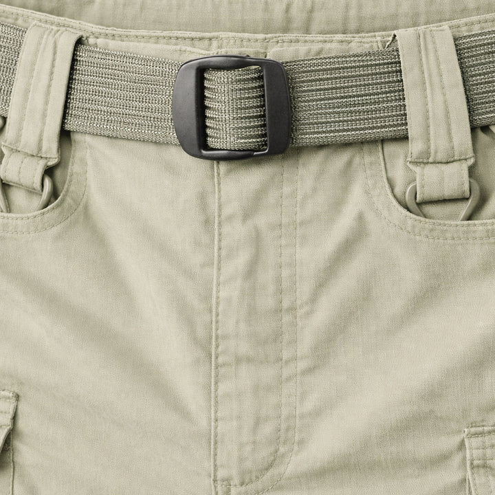 Close-up of tactical cargo shorts waistband with woven belt and black buckle