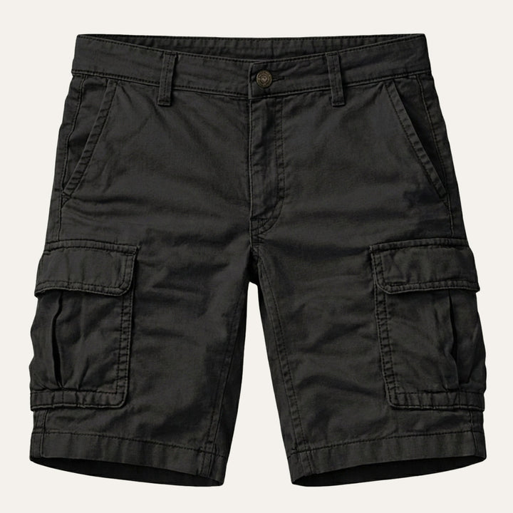 Charcoal gray tactical cargo shorts with flap pockets, front view on white background