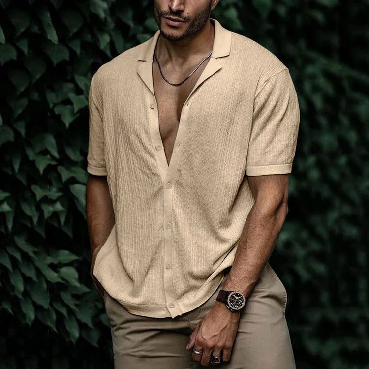 Beige textured short sleeve Cuban collar shirt styled with open collar and casual fit