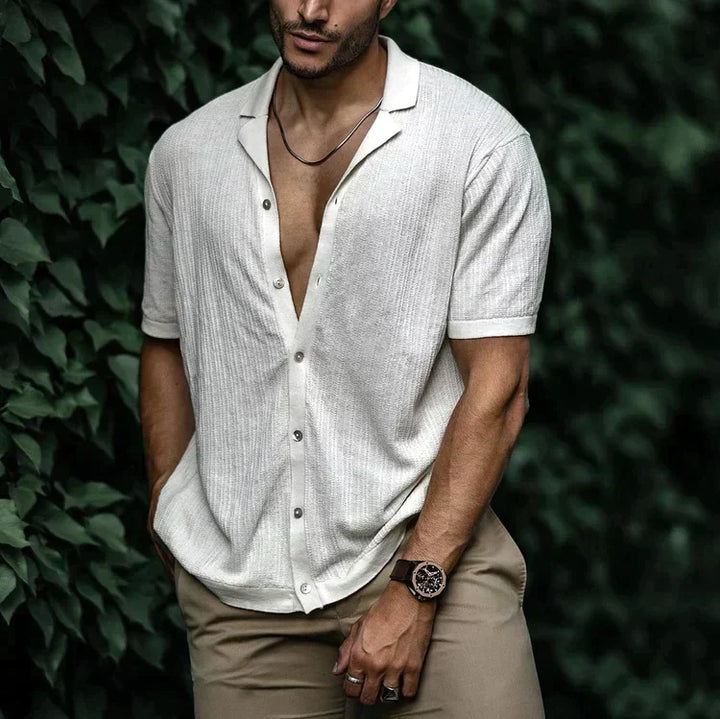 White textured short sleeve Cuban collar shirt with relaxed button-up front and open neckline