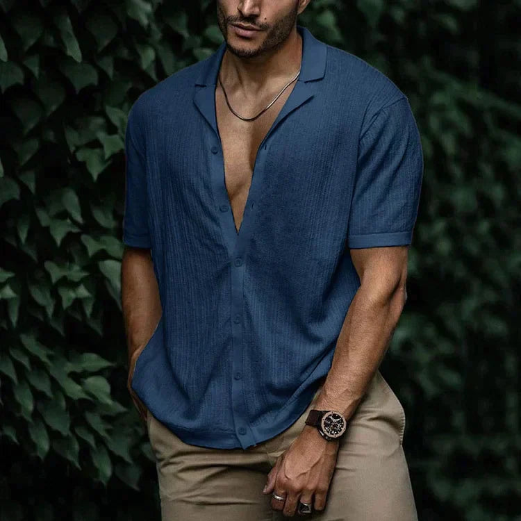 Navy blue textured short sleeve Cuban collar shirt with open neckline and casual summer style
