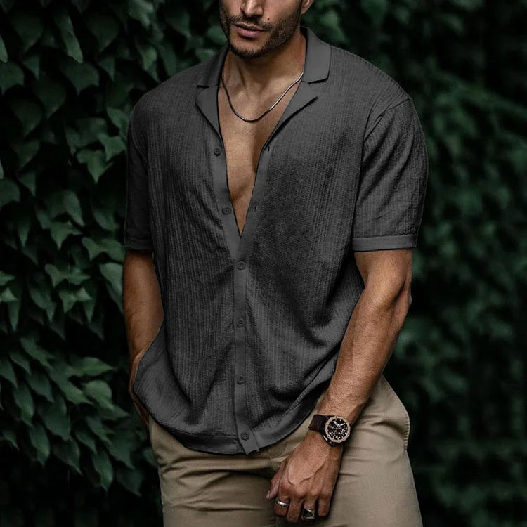 Dark charcoal textured short sleeve Cuban collar shirt with open V-neck and relaxed fit