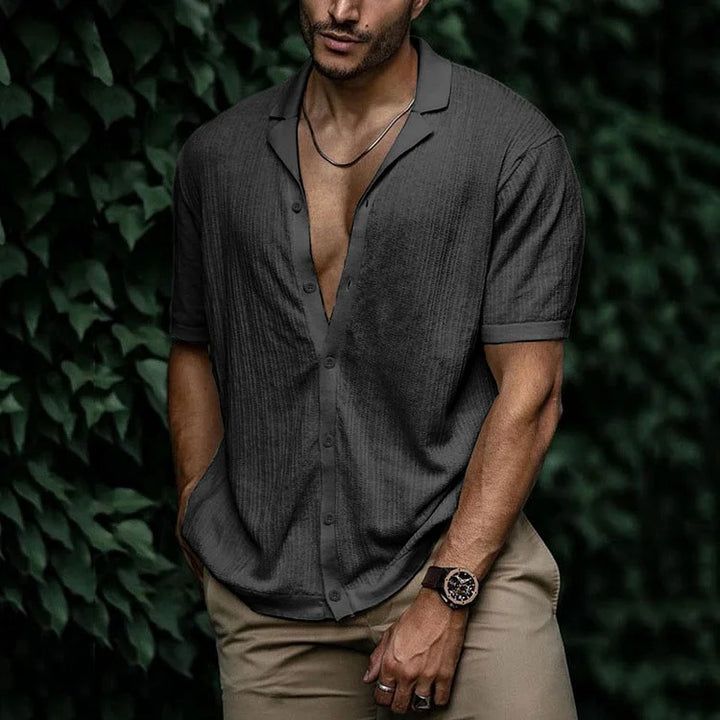 Dark charcoal textured short sleeve Cuban collar shirt with open V-neck and relaxed fit