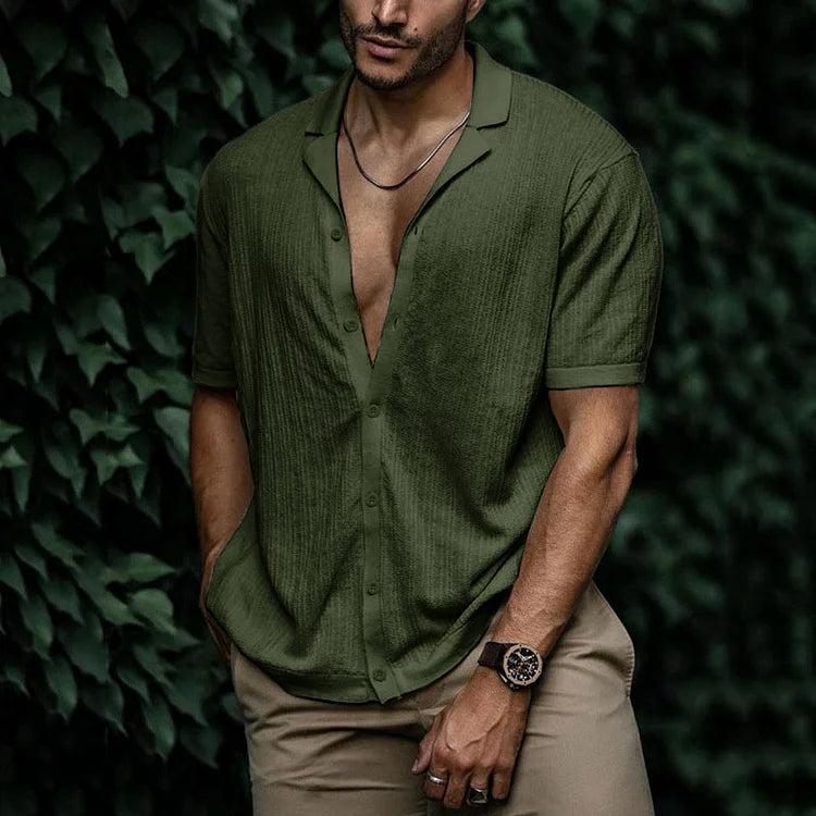 Olive green textured short sleeve Cuban collar shirt with open collar and button-up front