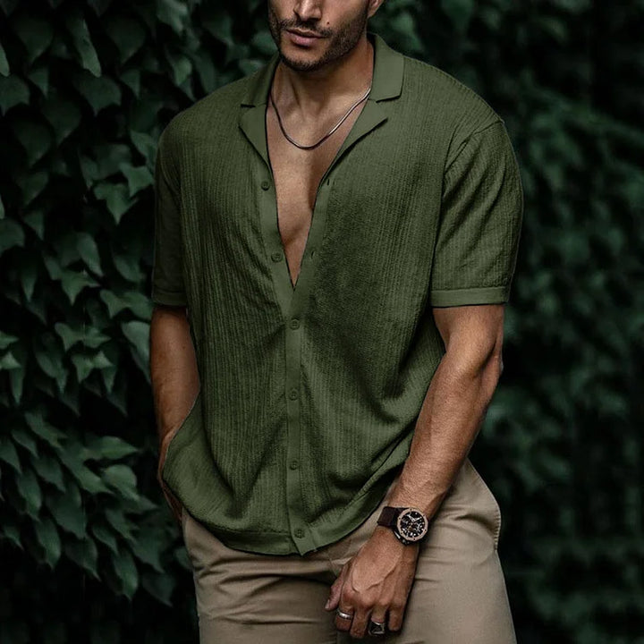 Olive green textured short sleeve Cuban collar shirt with open collar and button-up front