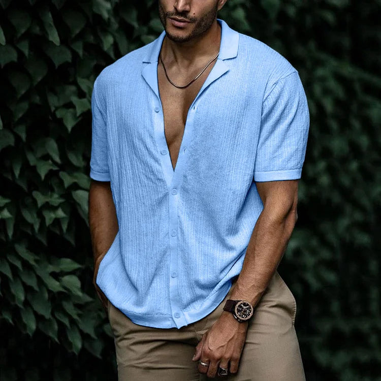 Light blue textured short sleeve Cuban collar shirt with open V-neck and button front