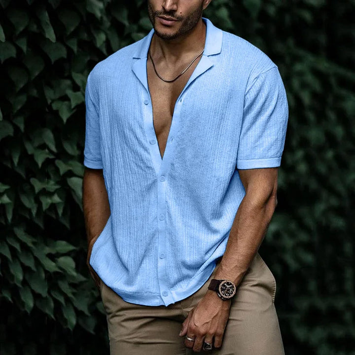 Light blue textured short sleeve Cuban collar shirt with open V-neck and button front