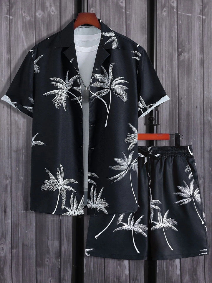 Black tropical palm print short sleeve shirt and matching shorts set with white palm leaves