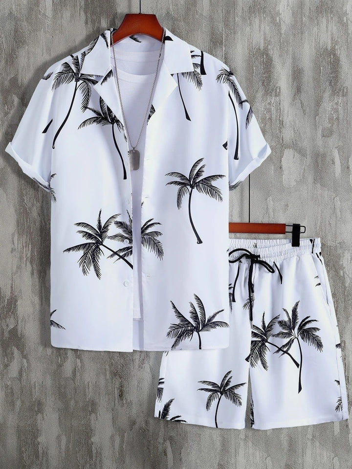 White tropical palm print short sleeve shirt and matching shorts set with black leaf pattern