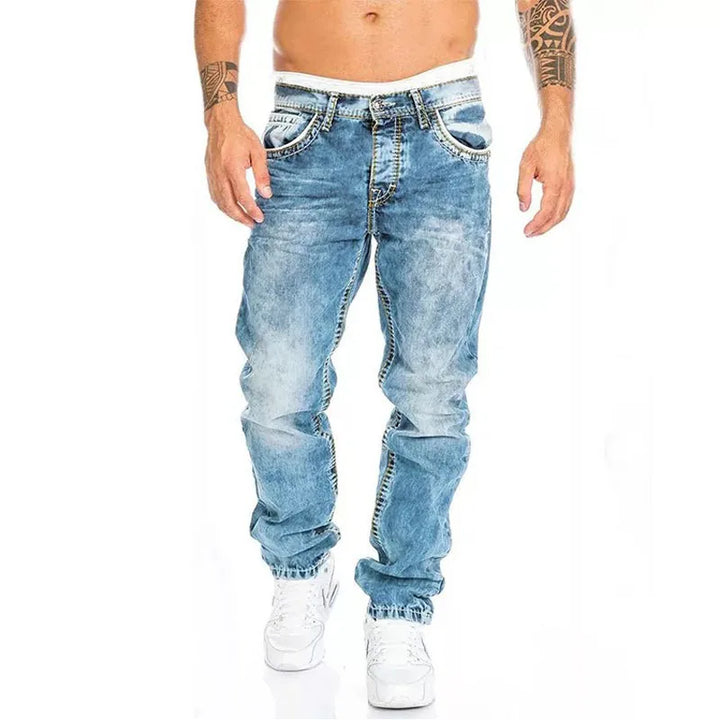 Light blue vintage wash wide leg jeans with loose fit and distressed faded detailing