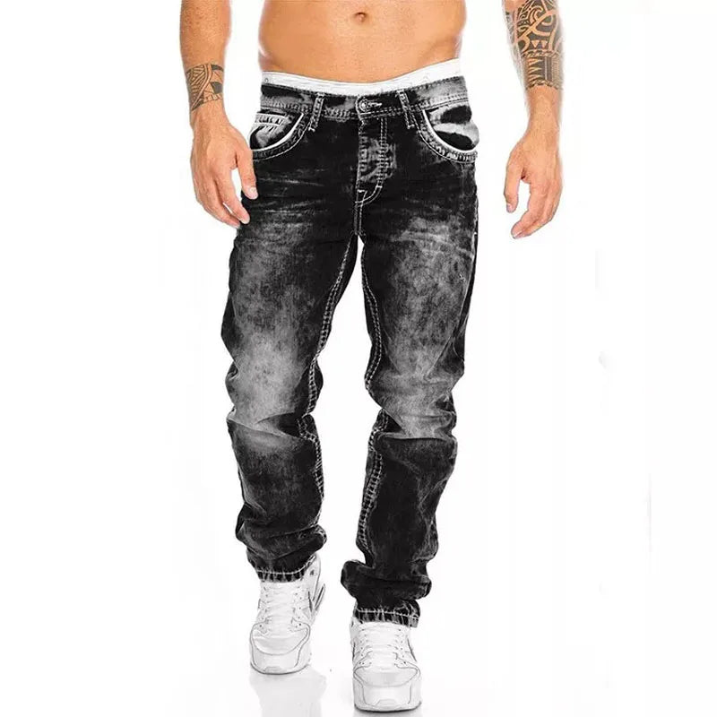 Black vintage wash baggy wide leg jeans with faded thighs and white sneakers