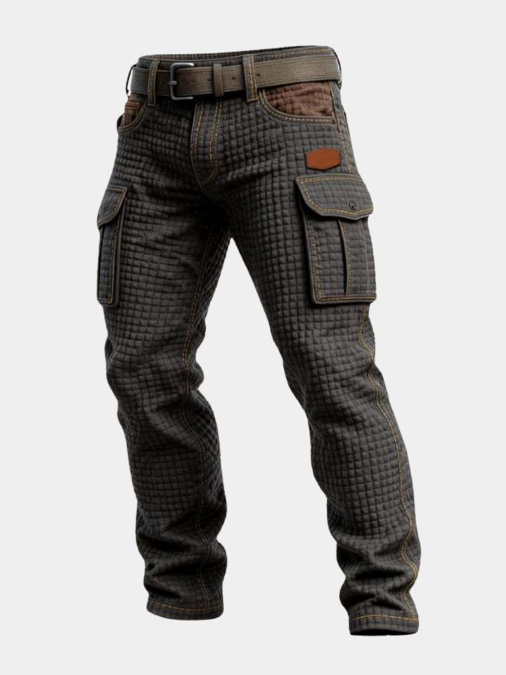 Dark quilted cargo jeans with belt, side pockets, and tapered legs on white background