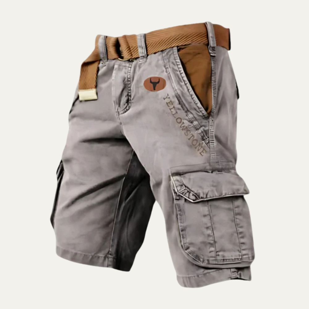 Side angle of gray cargo shorts with belt, showing large flap pocket and relaxed fit