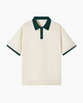 Cream short sleeve polo shirt with dark green contrast collar and sleeve trim