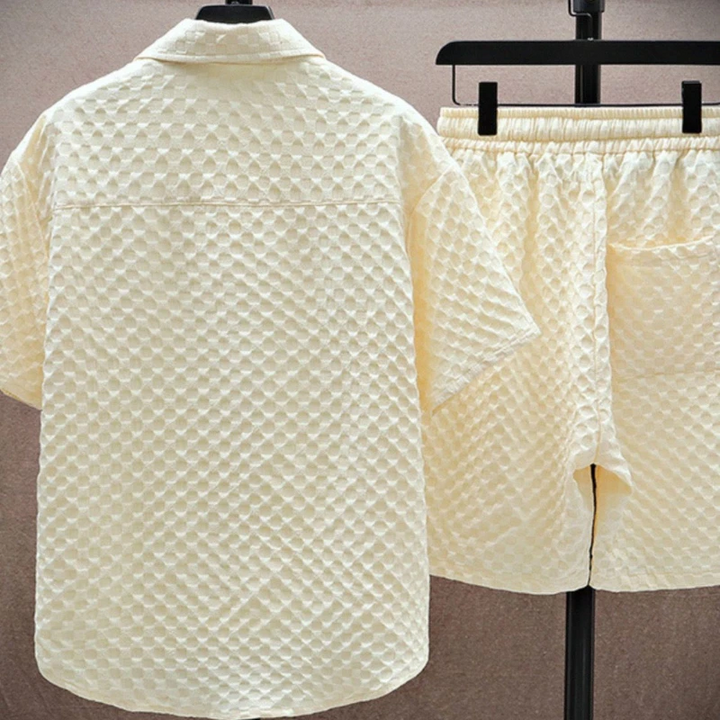 Back view of cream textured shirt and shorts set with diamond jacquard pattern