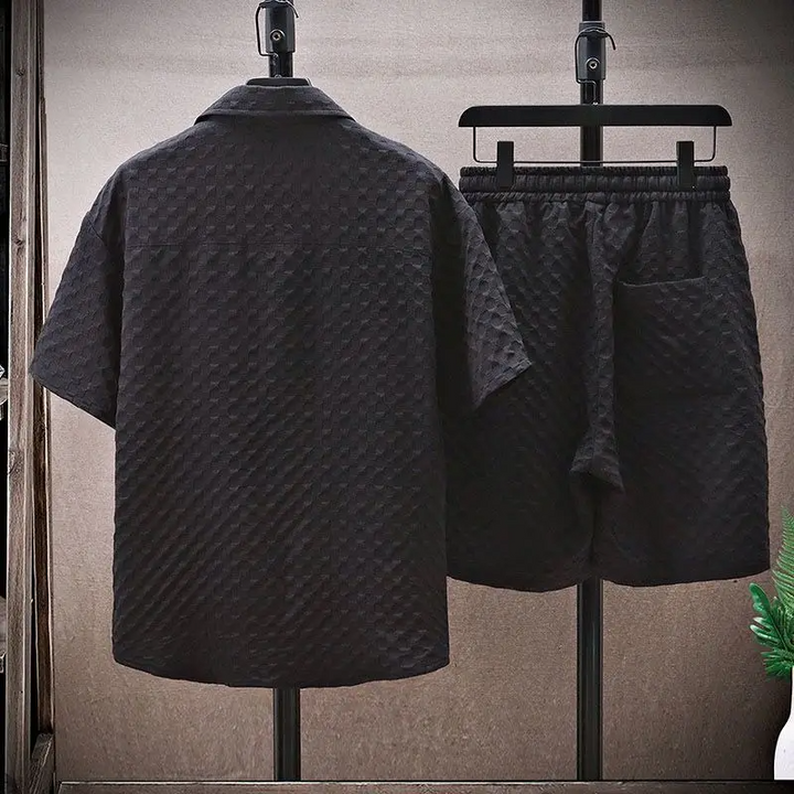 Back view of black textured shirt shorts set with diamond jacquard fabric