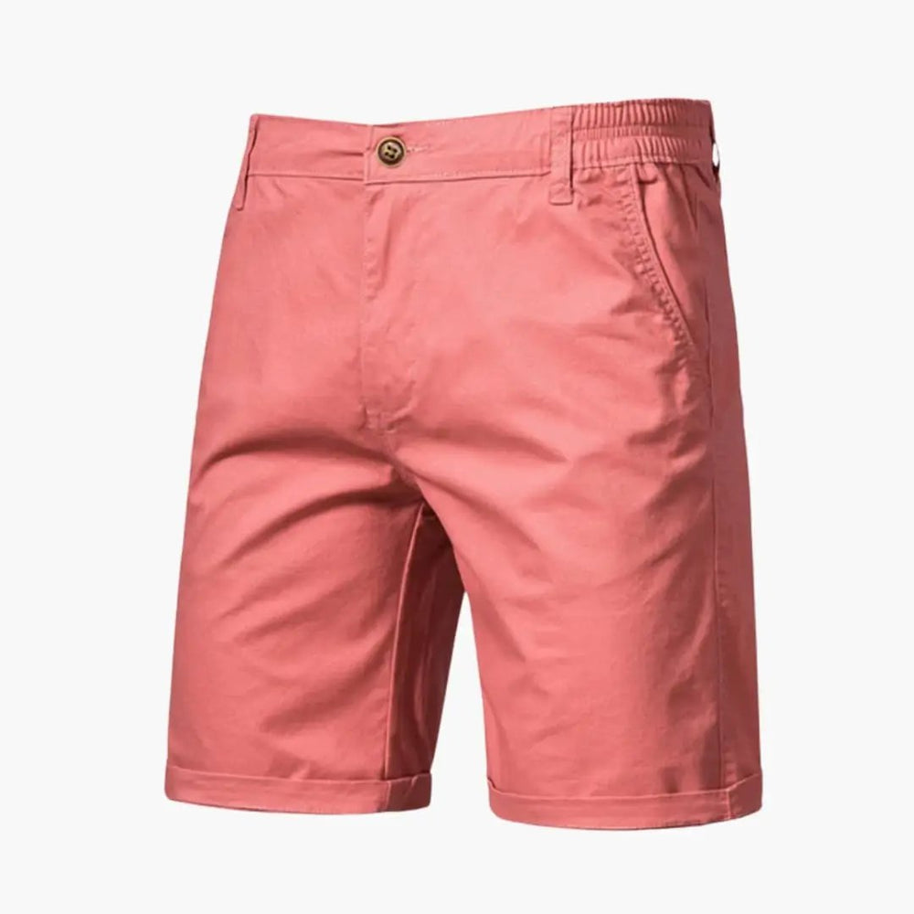 Coral pink men's casual shorts with pockets and cuffed knee length hem