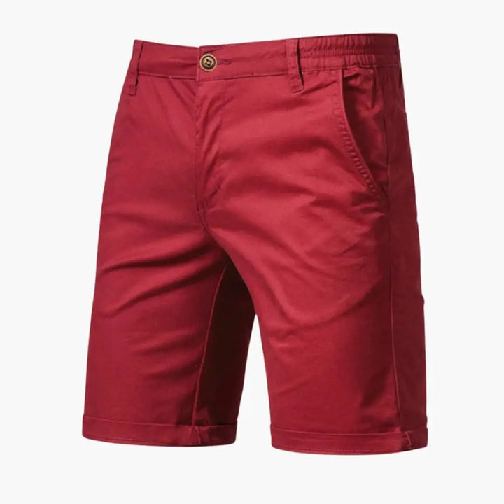 Red men's casual knee length shorts with pockets and rolled hem finish