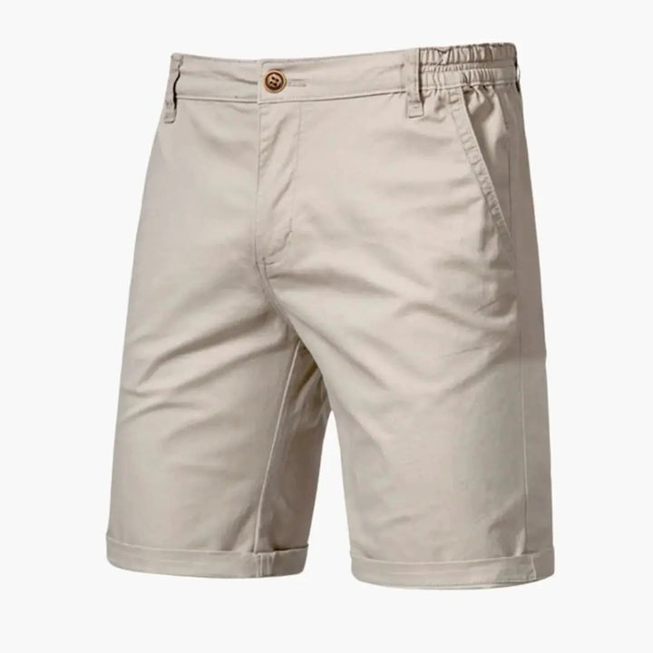 Beige men's casual knee length shorts with pockets and rolled hems